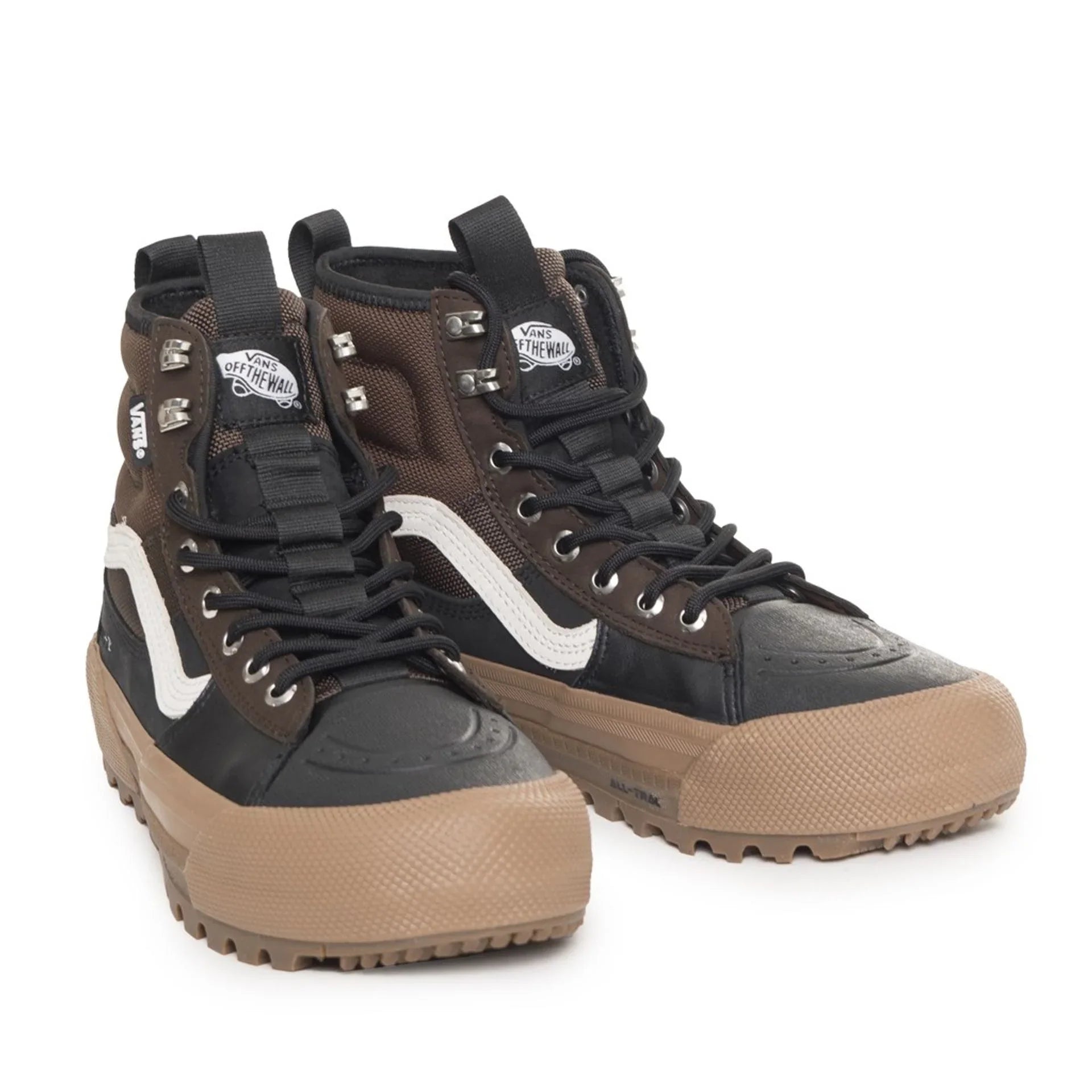 Unisex Vans high-top sneakers with round toe, rubber sole, metal eyelets, and black and brown leather upper.