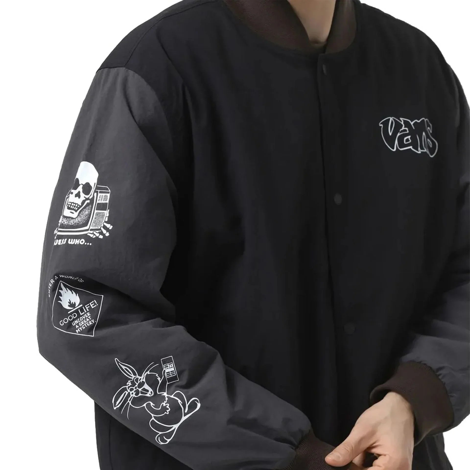 Men's Vans nylon jacket with zipper, long sleeves, and visible logo details on black and gray fabric.