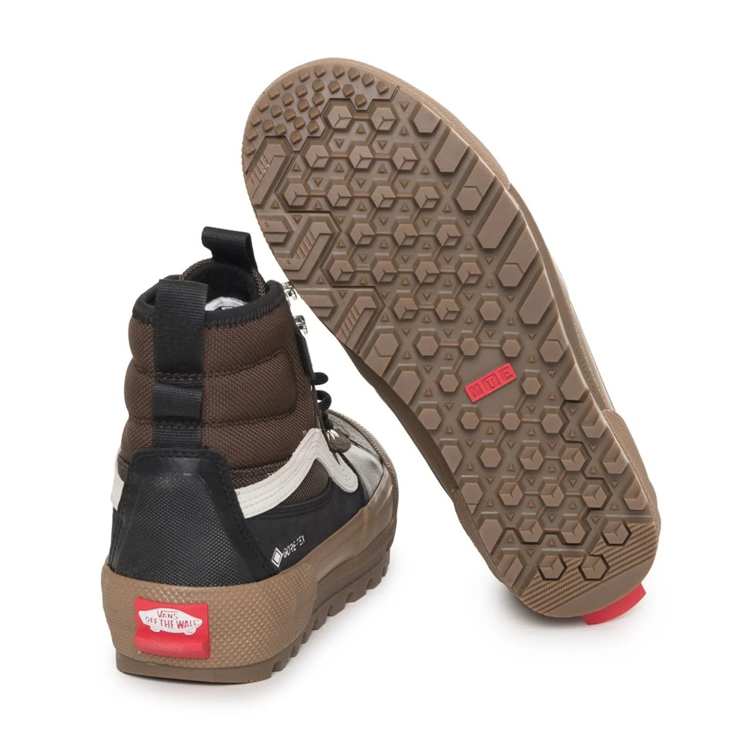 Unisex Vans sneakers with rubber sole and leather upper, featuring metal eyelets and round toe design.